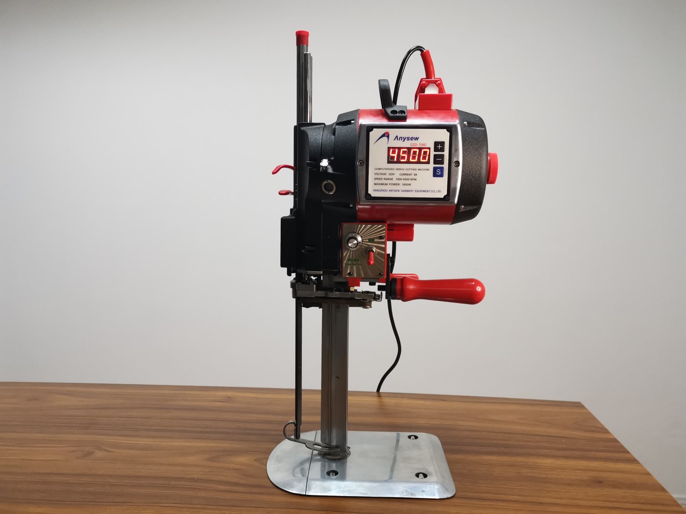 CZD-708D cutting machine standing on a work table, display reading 4500